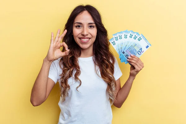 Young Mixed Race Woman Holding Bills Isolated Yellow Background Cheerful — Stock Photo, Image