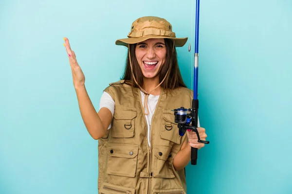 Young Caucasian Fisherwoman Isolated Blue Background Receiving Pleasant Surprise Excited — Stock Photo, Image