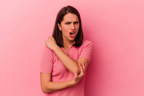 Jonge Blanke Vrouw Geïsoleerd Roze Achtergrond Masseren Elleboog Lijden Een — Stockfoto