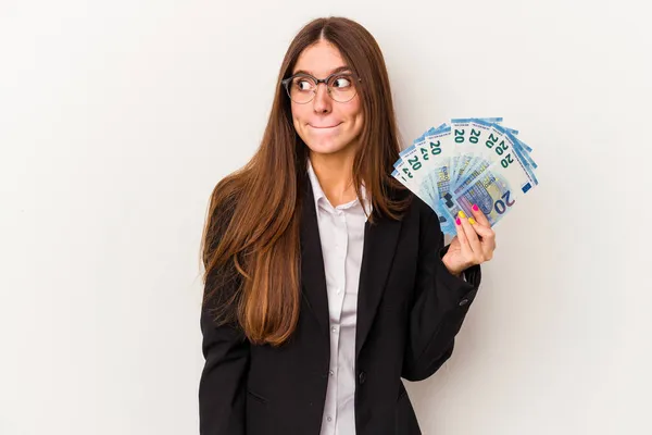 Young Caucasian Business Woman Holding Banknotes Isolated White Background Confused — Stock Photo, Image