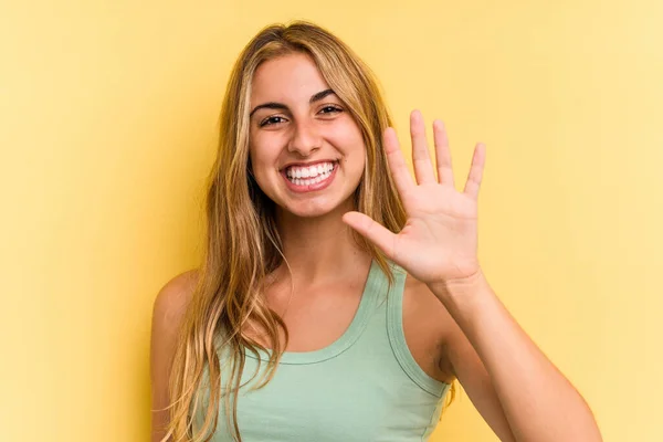 Young Caucasian Blonde Woman Isolated Yellow Background Smiling Cheerful Showing — Stock Photo, Image
