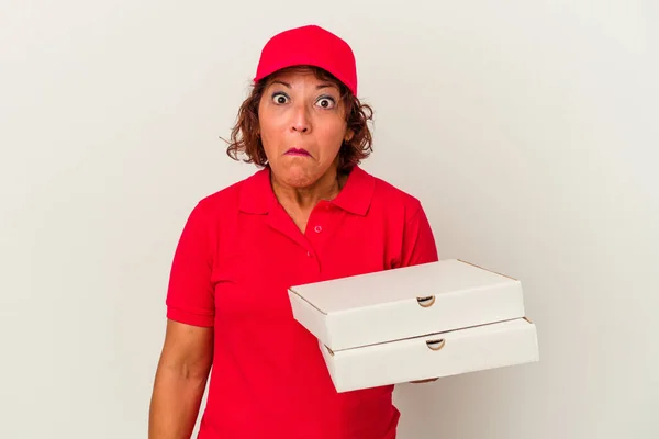 Middle Age Delivery Woman Taking Pizzas Isolated White Background Shrugs — Photo