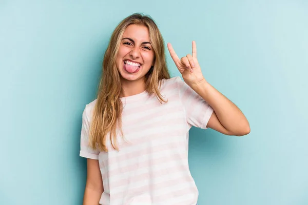 Young Caucasian Blonde Woman Isolated Blue Background Showing Horns Gesture — Stock Photo, Image