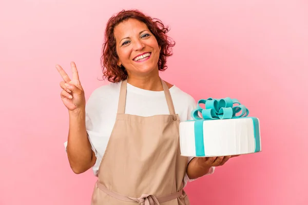 Middle Age Pastry Latin Woman Holding Cake Isolated Pink Background —  Fotos de Stock