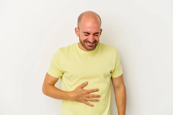 Jovem Careca Isolado Fundo Branco Toca Barriga Sorri Suavemente Comendo — Fotografia de Stock