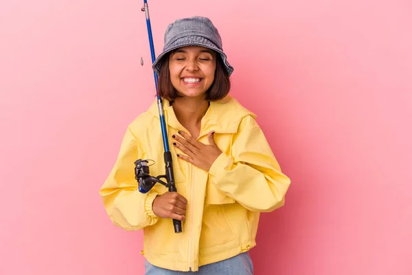 Young Mixed Race Woman Practicing Fishing Isolated Pink Background Laughing — Stock Photo, Image