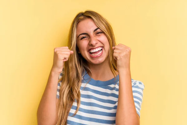Young Caucasian Blonde Woman Isolated Yellow Background Cheering Carefree Excited — Stock Photo, Image