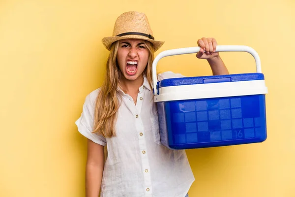 Young Caucasian Woman Holding Refrigerator Isolated Yellow Background Screaming Very — Stock Photo, Image