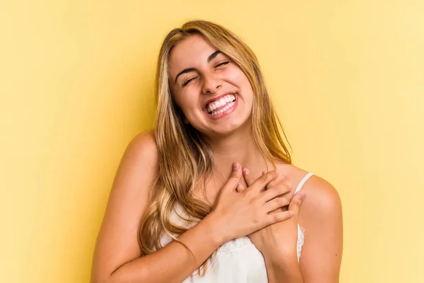 Young Caucasian Blonde Woman Isolated Yellow Background Has Friendly Expression — Stock Photo, Image