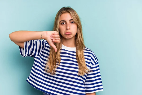 Young Caucasian Blonde Woman Isolated Blue Background Showing Dislike Gesture — Stock Photo, Image