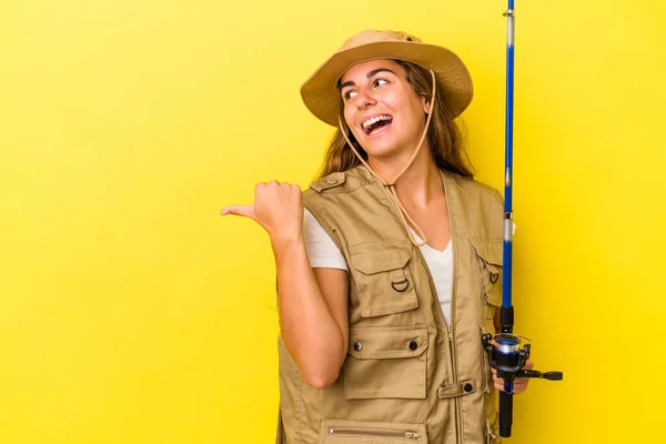 Young Caucasian Fisherwoman Holding Rod Isolated Yellow Background Points Thumb — Stock Photo, Image