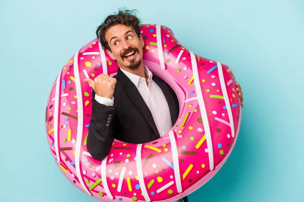Young Business Man Inflatable Donut Isolated Blue Background Points Thumb — 图库照片