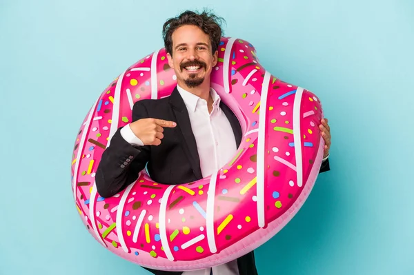 Young Business Man Inflatable Donut Isolated Blue Background Person Pointing — 图库照片