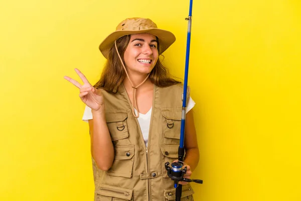 Young Caucasian Fisherwoman Holding Rod Isolated Yellow Background Joyful Carefree — Stock Photo, Image