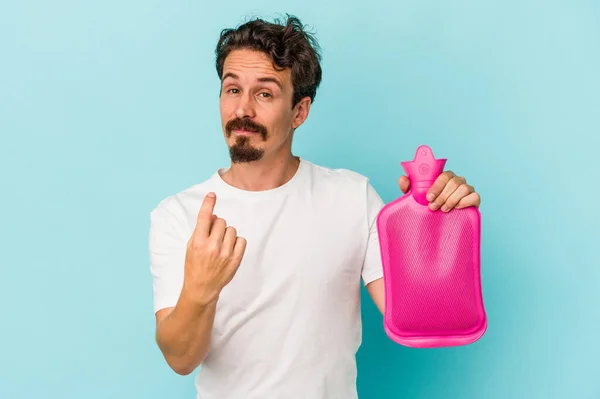 Young Caucasian Man Holding Water Bag Isolated Blue Background Pointing — 图库照片