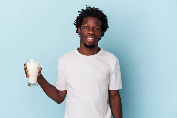 Young African American Man Holding Glass Milk Isolated Blue Background — 스톡 사진