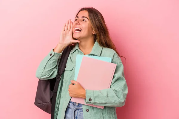 Young Caucasian Student Woman Holding Books Isolated Pink Background Shouting — Stock Photo, Image