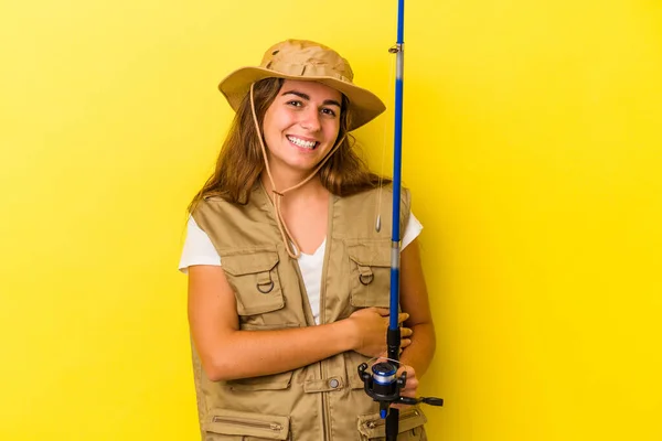 Young Caucasian Fisherwoman Holding Rod Isolated Yellow Background Laughing Having — Stock Photo, Image