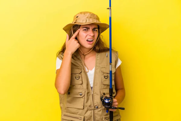 Young Caucasian Fisherwoman Holding Rod Isolated Yellow Background Showing Disappointment — Stock Photo, Image