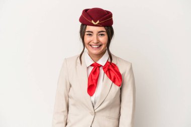 Young caucasian stewardess woman isolated on white background happy, smiling and cheerful.