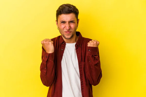 Young Caucasian Man Tattoos Isolated Yellow Background Showing Fist Camera —  Fotos de Stock