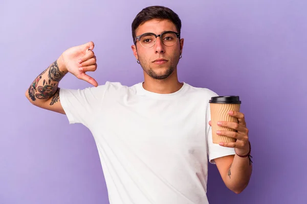 Young Caucasian Man Holding Take Away Coffee Isolated Purple Background —  Fotos de Stock