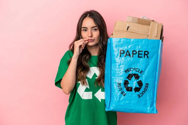 Young Caucasian Woman Recycled Paper Isolated Pink Background Fingers Lips — 스톡 사진