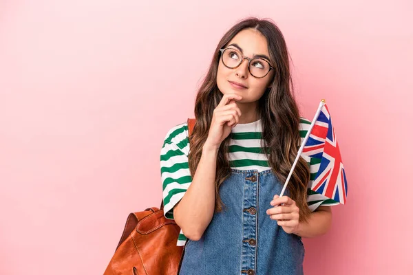 Young Caucasian Student Woman Studying English Isolated Pink Background Looking — Stock fotografie