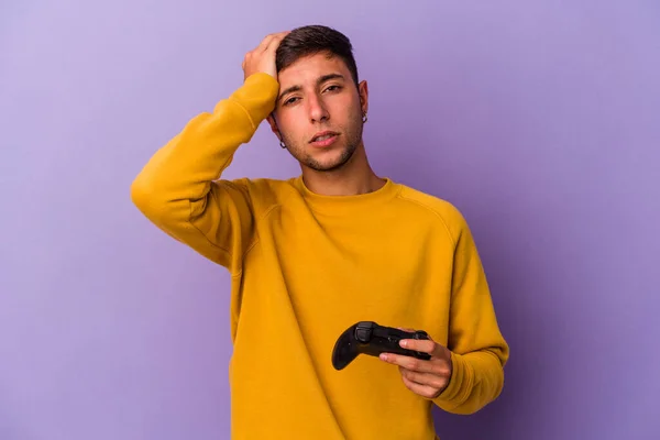 Young Caucasian Man Holding Game Controller Isolated Purple Background Being — Stock Photo, Image