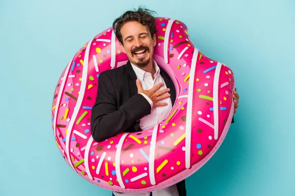 Young Business Man Inflatable Donut Isolated Blue Background Laughs Out — 图库照片