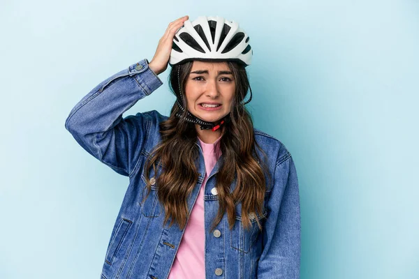 Young Caucasian Woman Rinding Bike Isolated Blue Background Being Shocked — Stock Photo, Image