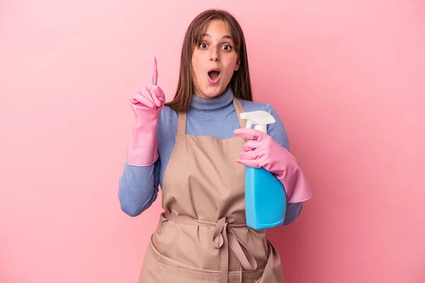 Young Caucasian Cleaner Woman Holding Spray Isolated Pink Background Having — Stock Photo, Image