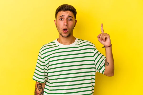 Young Caucasian Man Tattoos Isolated Yellow Background Having Some Great —  Fotos de Stock