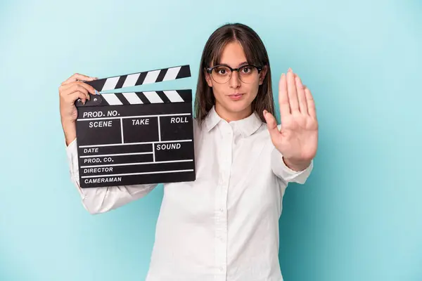Young Caucasian Woman Holding Clapperboard Isolated Blue Background Standing Outstretched — 图库照片