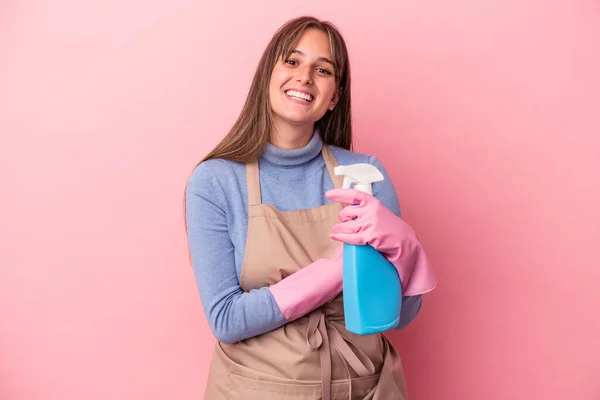 Young Caucasian Cleaner Woman Holding Spray Isolated Pink Background Laughing — Stock Photo, Image