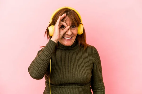 Middle Age Caucasian Woman Listening Music Isolated Pink Background Excited — ストック写真
