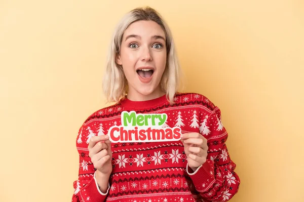 Young Caucasian Woman Holding Christmas Props Isolated Yellow Background — Stock Photo, Image