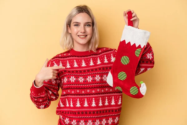 Young Caucasian Woman Holding Elf Sock Isolated Yellow Background Person — Stock Photo, Image