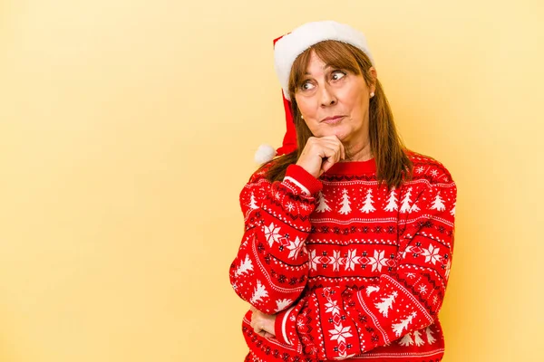 Middle Age Caucasian Woman Celebrating Christmas Isolated Yellow Background Looking — Φωτογραφία Αρχείου