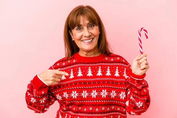 Middle Age Caucasian Woman Holding Christmas Stick Isolated Pink Background — Stock Photo, Image