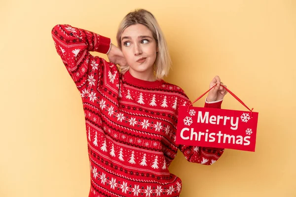 Young Caucasian Woman Holding Merry Christmas Placard Isolated Yellow Background — Stock Photo, Image