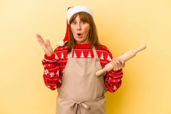 Middle Age Caucasian Woman Cooking Cookies Christmas Isolated Yellow Background — Zdjęcie stockowe