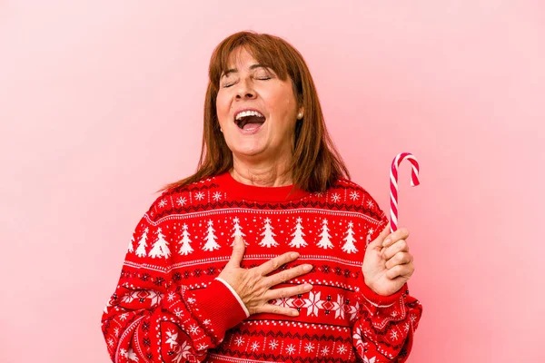 Middle Age Caucasian Woman Holding Christmas Stick Isolated Pink Background — 스톡 사진
