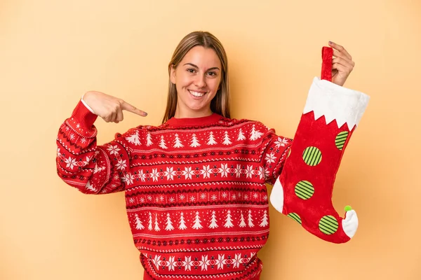 Young Caucasian Woman Holding Elf Sock Isolated Yellow Background Person — Stock Photo, Image