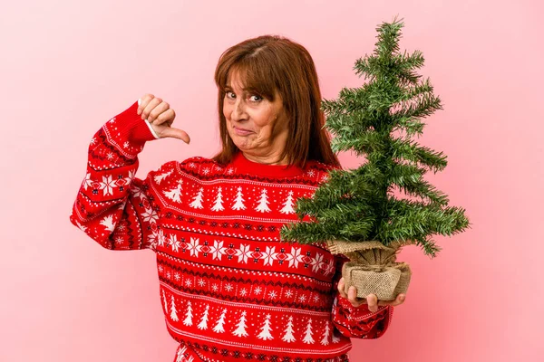 Middle Age Caucasian Woman Holding Christmas Tree Isolated Pink Background — Stock Photo, Image