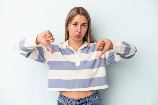 Young Caucasian Woman Isolated Blue Background Showing Dislike Gesture Thumbs — Stock Photo, Image