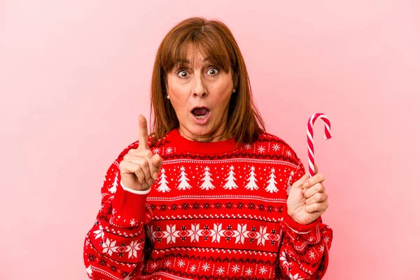 Middle Age Caucasian Woman Holding Christmas Stick Isolated Pink Background — Stock Photo, Image