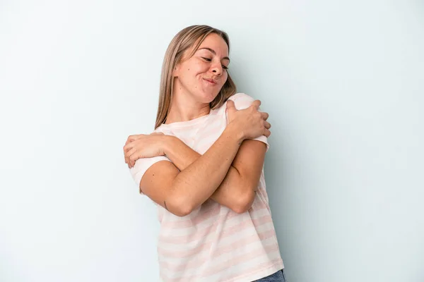 Young Caucasian Woman Isolated Blue Background Hugs Smiling Carefree Happy — Stock Photo, Image