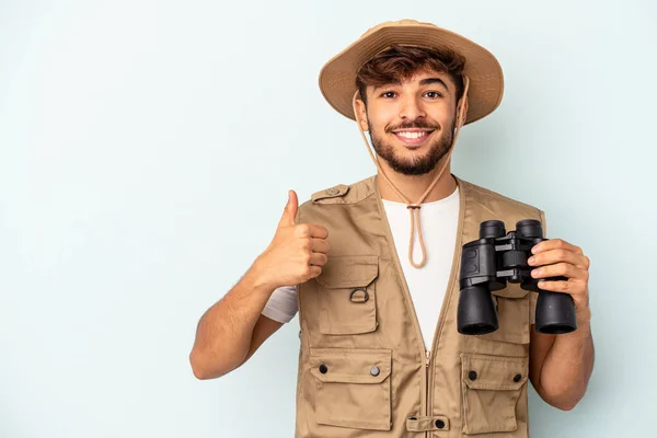 Young Mixed Race Man Holding Binoculars Isolated Blue Background Smiling — 图库照片