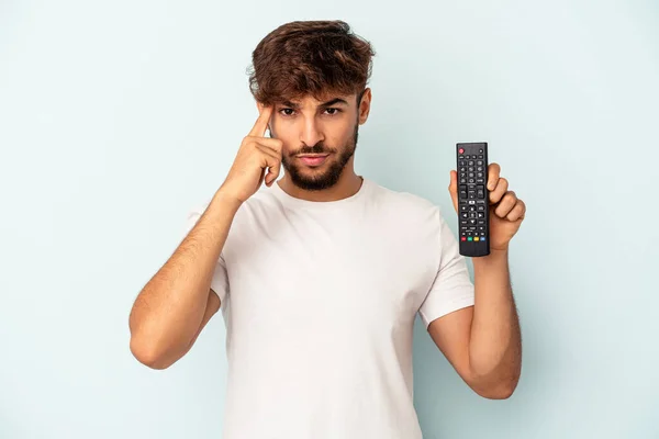 Young Mixed Race Man Holding Controller Isolated Blue Background Pointing — Fotografia de Stock